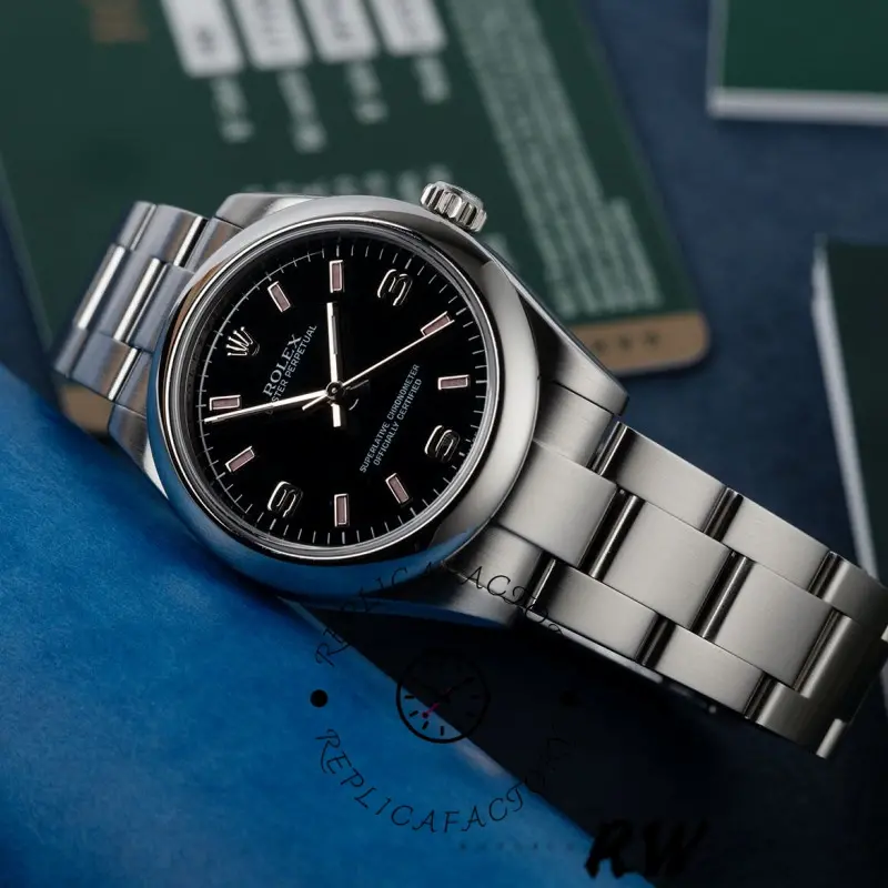 Rolex Oyster Perpetual 177200 Black Dial Pink Baton 31mm Lady Replica Watch - QualitySwissReplica